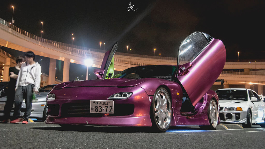 Pink JDM car at Daikoku PA during a weekend car meet